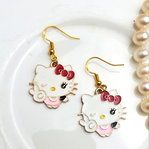 🌟5/$25 Hello Kitty peace sign earrings - Picture 2 of 3